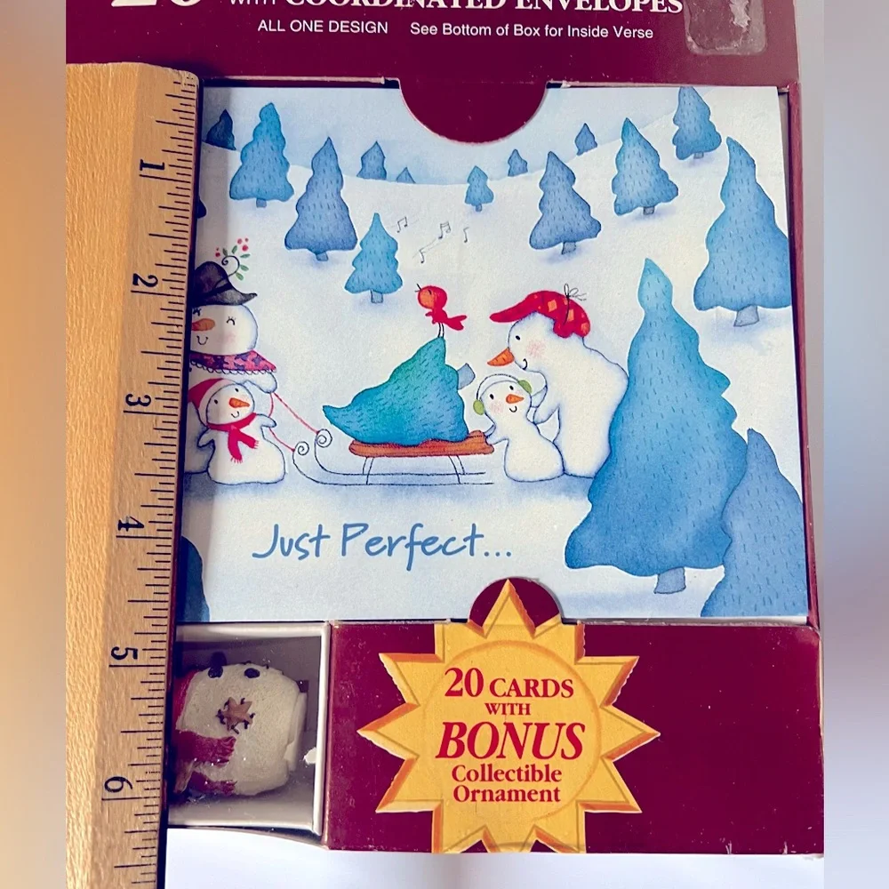 Twenty Vintage Christmas Cards Showing a Snow Person Family in the Snow.
